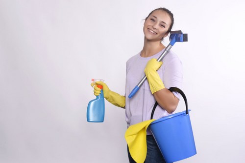Technician treating a lingering pet urine stain in a hallway carpet